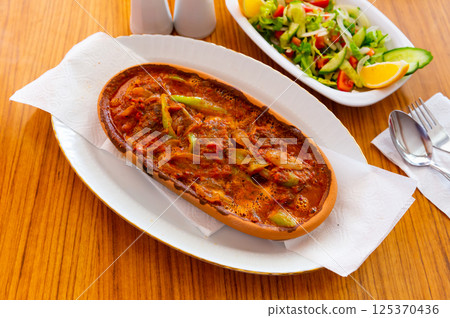 Izmir kofte, turkish dish of spicy meatballs Izmir kofte, turkish dish of spicy meatballs 125370436