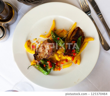 Grilled beef with french fries Grilled beef with french fries 125370464