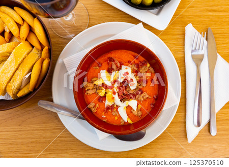 Bowl of cold porra antequerana, Spanish cuisine 125370510