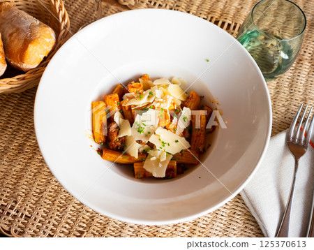 Italian bolonesa, bolognese noodles with tomato sauce and parmesan bolognese sauce Italian bolonesa, bolognese noodles with tomato sauce and parmesan bolognese sauce 125370613