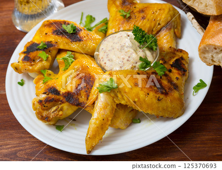 Delicious fried chicken wings 125370693