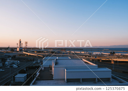 [Kansai International Airport] Beautiful view of the airport illuminated by the light of the setting sun 125370875