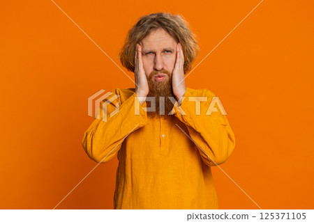 Caucasian man rubbing temples to cure headache problem suffering from tension migraine stress pain 125371105
