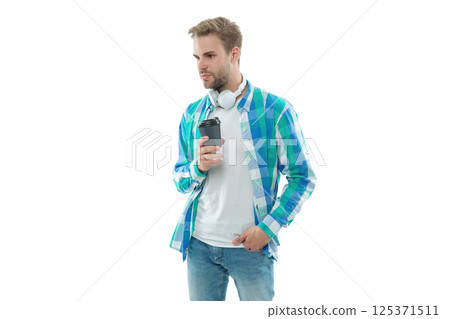 Man drinking tea. Warm morning. Coffee break at work. Millennial man hold coffee cup isolated on white. Morning coffee time. Lifestyle concept. Drinking cappuccino. Relax with music 125371511