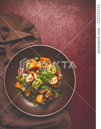 Warm Salad, Saksuka, with crispy eggplant, and tomatoes, spices, herbs, sesame seeds, sunflower seeds, Turkish cuisine, no people, 125371531