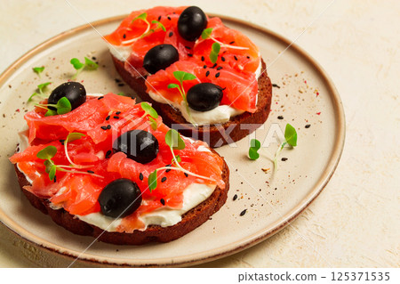 sandwiches with red fish, cream cheese, olives and microgreens, breakfast, sandwiches with red fish, cream cheese, olives and microgreens, breakfast, 125371535