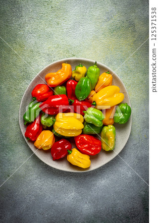 habanero pepper, color mix, raw, vegetable, top view, no people, habanero pepper, color mix, raw, vegetable, top view, no people, 125371538