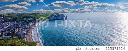 Fantastic aerial view on Normandian coastline and beach and water of Manche (English channel). Fantastic aerial view on Normandian coastline and beach and water of Manche (English channel). 125371624