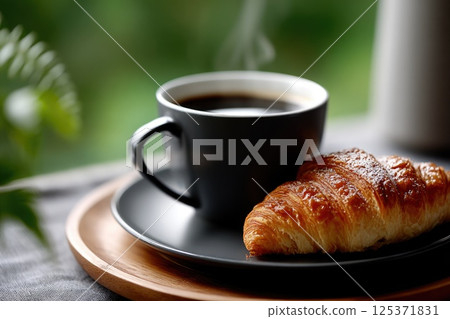 Freshly Baked Croissant with Steaming Cup of Coffee 125371831