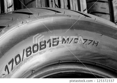 Road motorcycle rear tire size label on tire sidewall, width, height and diameter, big bike tire 125372337