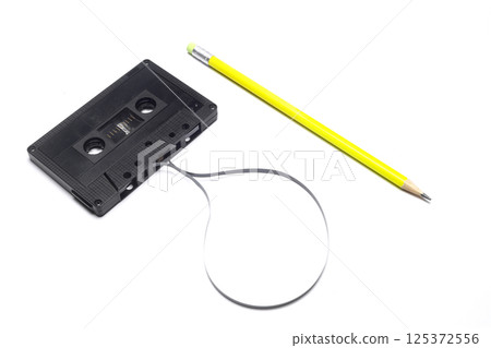 A pen for rewind cassette tape compact retro on white background. 90's concepts. A pen for rewind cassette tape compact retro on white background. 90's concepts. 125372556