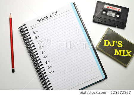Retro audio cassette tape from the 80s and 90s on a white backgroun 125372557
