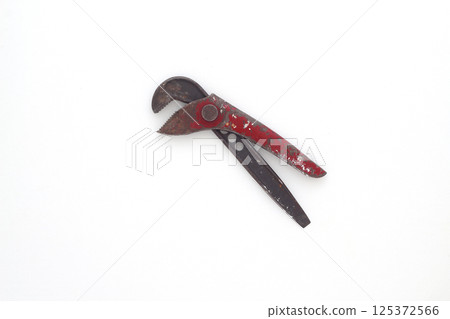 old plumbing pliers isolated on a white background 125372566
