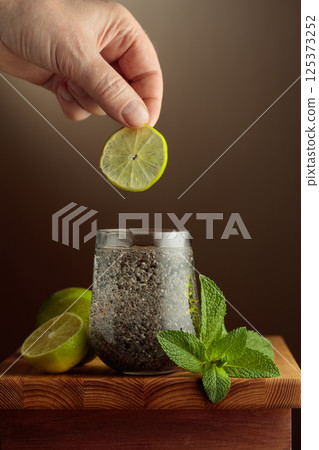 Diet and detox cocktail with chia seeds, lime, and mint. 125373252