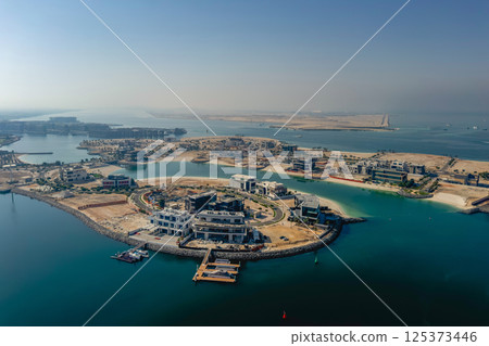 Construction Dubai Palm island from above. Construction Dubai Palm island from above. 125373446