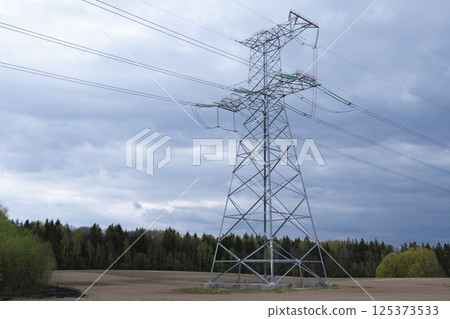 Electric power masts and cables, pylons. Electricity power station. Electric power masts and cables, pylons. Electricity power station. 125373533