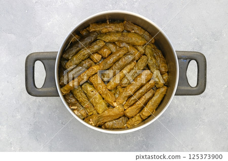 Stuffed collard greens with boiled leaves, traditonal turkish black sea region food, sarma, dolma 125373900