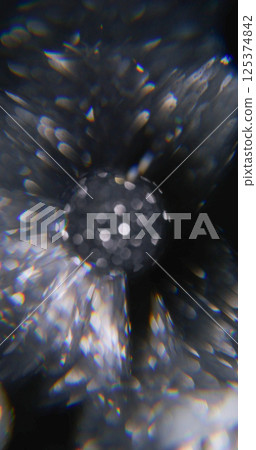 Sparkling ball. Blur rainbow flare. Defocused light lens texture round gleam spectrum moving on abstract art dark black background. Sparkling ball. Blur rainbow flare. Defocused light lens texture round gleam spectrum moving on abstract art dark black background. 125374842