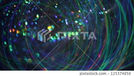 Blur radiance. Defocused round festive. Colorful bright gleaming beautiful particles lens flare motion on abstract bokeh light modern background. 125374850