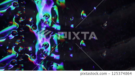 Moving particles. Defocused colorful transparent. Bubbles texture sparkling gleaming liquid motion on blurred bokeh light modern background. Moving particles. Defocused colorful transparent. Bubbles texture sparkling gleaming liquid motion on blurred bokeh light modern background. 125374864