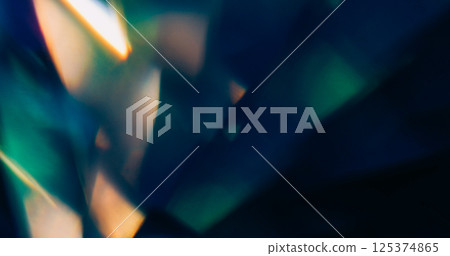 Flare light. Blur optical leak. Defocused blue yellow golden color lens sparkle texture on abstract dark black background. Flare light. Blur optical leak. Defocused blue yellow golden color lens sparkle texture on abstract dark black background. 125374865