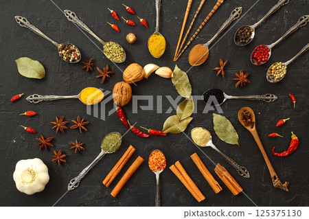 Big set of Indian spices on wooden table. Top view, Horizontal image. 125375130