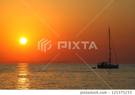 sunset and sailing boat. Turgutreis, Bodrum. sunset and sailing boat. Turgutreis, Bodrum. 125375233