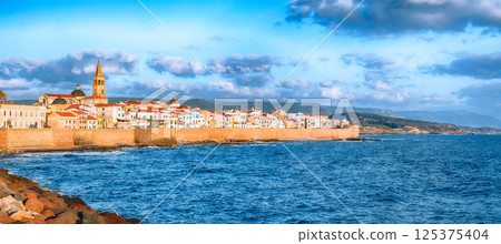 Amazing evening cityscape of historical part of Alghero town. Amazing evening cityscape of historical part of Alghero town. 125375404