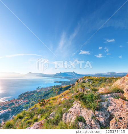 Fantastic view of Porticello and Santa Flavia towns and national park Orientata Pizzo Cane 125375415