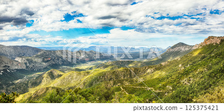 Unbelivable view of Mountain massif of the Gorropu Canyon. Unbelivable view of Mountain massif of the Gorropu Canyon. 125375421