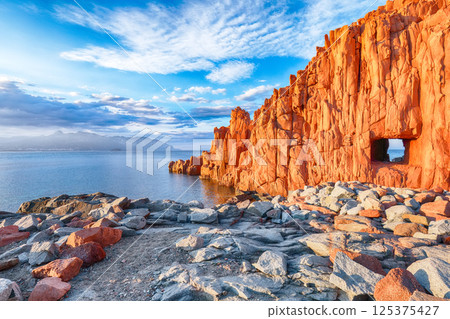 Impressive sunset view of Red Rocks (Rocce Rosse) in Arbatax. 125375427