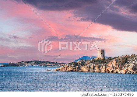 Marvelous sunset view  of Teulada bay with turquoise sea and famous coastal tower Torre del Budello 125375450