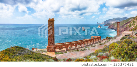 Astonishing spring view of ancient ruins of Laveria Lamarmora (Miniera di Nebida). Astonishing spring view of ancient ruins of Laveria Lamarmora (Miniera di Nebida). 125375451