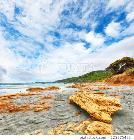 Marvelous view of beach near Capo Carbonara lighthouse. Marvelous view of beach near Capo Carbonara lighthouse. 125375491
