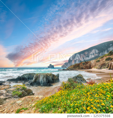 Attractive view of beach Portu Cauli in Masua with Pan di Zucchero at background. Attractive view of beach Portu Cauli in Masua with Pan di Zucchero at background. 125375508