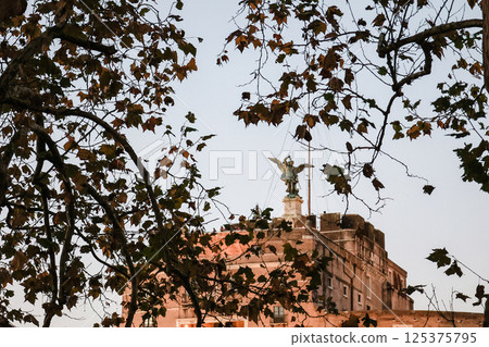 Rome in the evening. Panoramic view of Castel Sant'Angelo and Bridge in Rome. Rome in the evening. Panoramic view of Castel Sant'Angelo and Bridge in Rome. 125375795