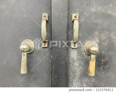 Retro metal safe door and knob 125376811