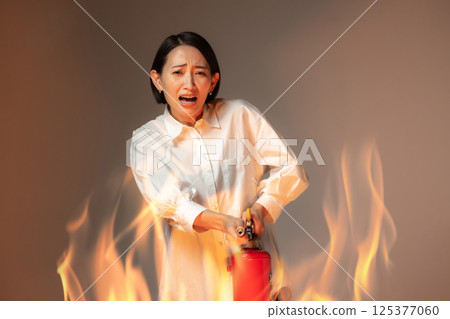 Woman Fire Extinguisher 125377060