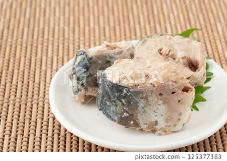 Delicious boiled mackerel (canned mackerel) served on a plate Delicious boiled mackerel (canned mackerel) served on a plate 125377383
