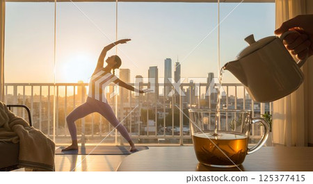 A quiet moment of yoga and tea to clear your mind while basking in the morning sun 2 AI-generated image 125377415