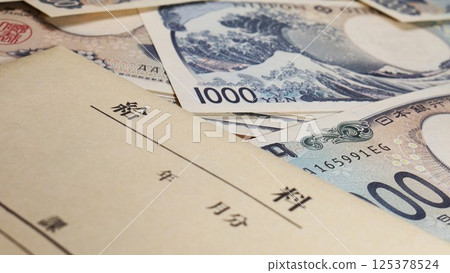 Pay envelope and a lot of bills 125378524