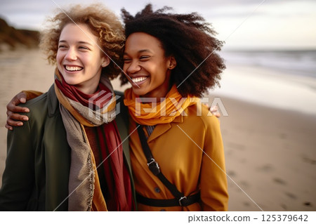 Oceanic Bonds Joyful Embrace of Two Women on a Breezy Beach, Laughter Echoing Waves, Windswept Hair, and Warm Scarves Unveiling Deep Connections. created with Generative AI 125379642