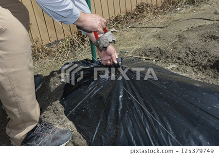 Black multi-hole drilling 125379749