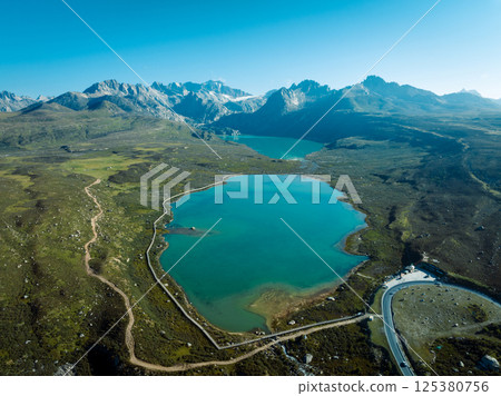 Aerial view of beautiful lake in high altitude mountains landscape Aerial view of beautiful lake in high altitude mountains landscape 125380756
