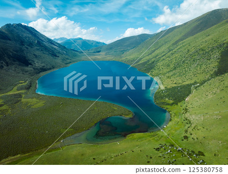 Aerial view of beautiful lake in high altitude mountains landscape 125380758