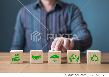 ESG environment social governance,Green Business Innovation and Sustainable Development concept.wood block with icon reduce co2,and reduce global warming,climate change,ecology friendly investment. ESG environment social governance,Green Business Innovation and Sustainable Development concept.wood block with icon reduce co2,and reduce global warming,climate change,ecology friendly investment. 125381173