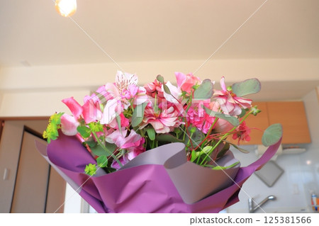 Bouquet of pink flowers and purple flowers 125381566