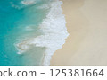 Aerial View of Waves on Sandy Beach 125381664