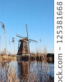 Dutch Windmill by the Water 125381668