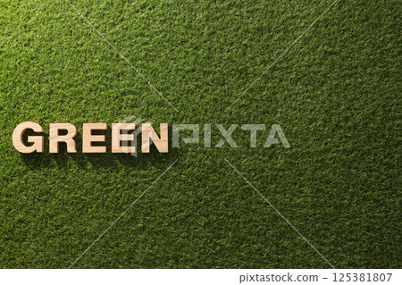 The word: "GREEN" on freshly cut grass. The word: "GREEN" on freshly cut grass. 125381807